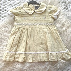 Baby girl size 3/6 months, yellow smocked boutique dress with ruffle bloomers.